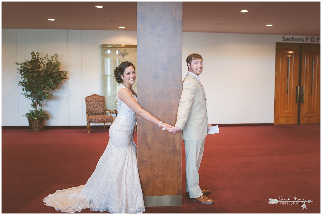 Bride and Groom exchanging letters and praying together in the lobby of Bellevue Baptist Church