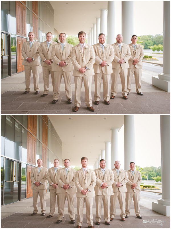 Groom and Groomsmen, wearing khaki suits under the portico at Bellevue Baptist Church