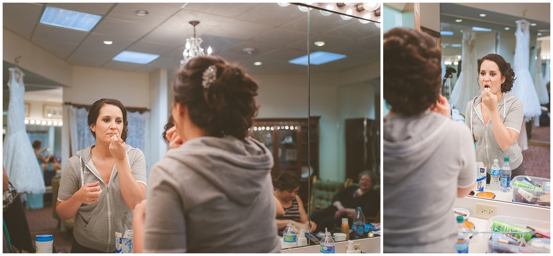 Bride putting on her make up in the bride's room at Bellevue Baptist Church