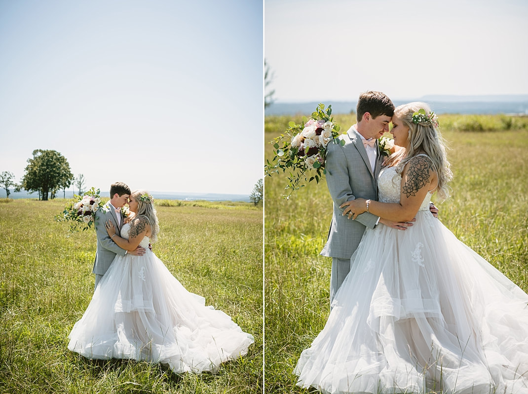 bride and groom wedding photos on love mountain at the wedding barn in arkansas