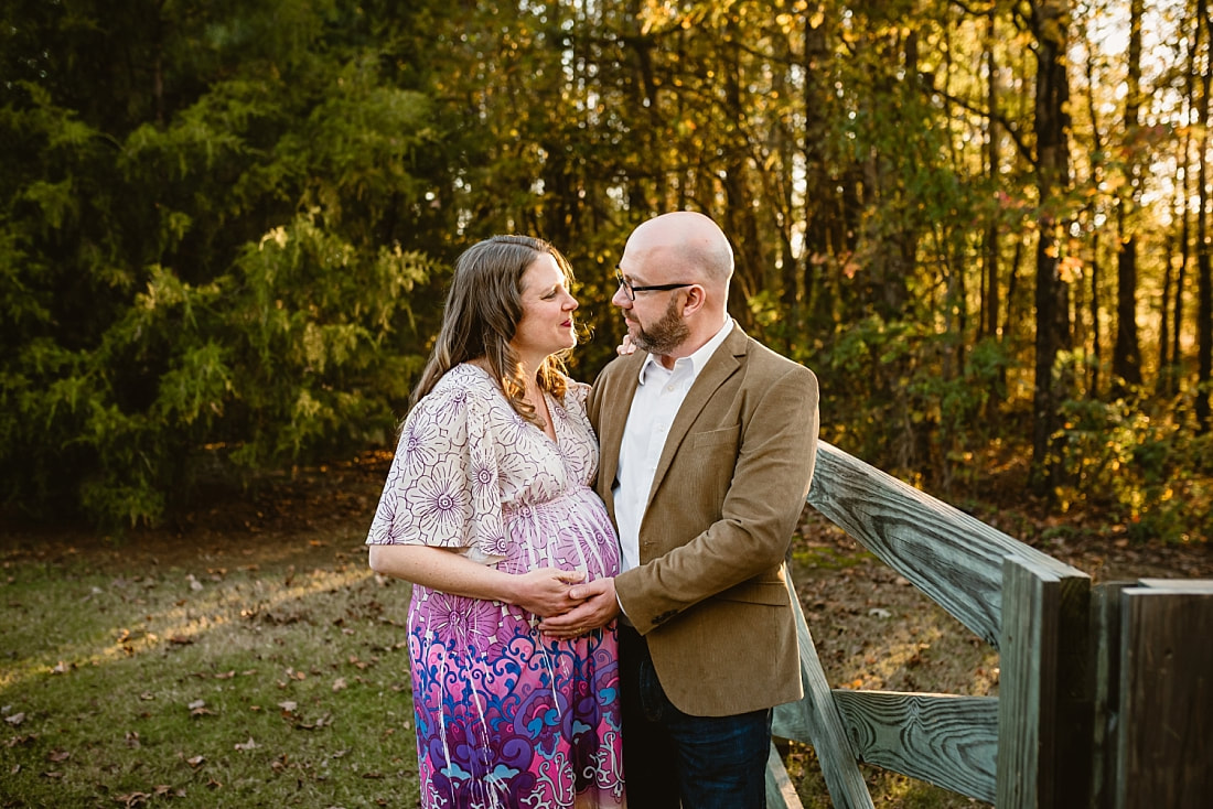 fall maternity photos at Hinton Park in Collierville, TN during golden hour