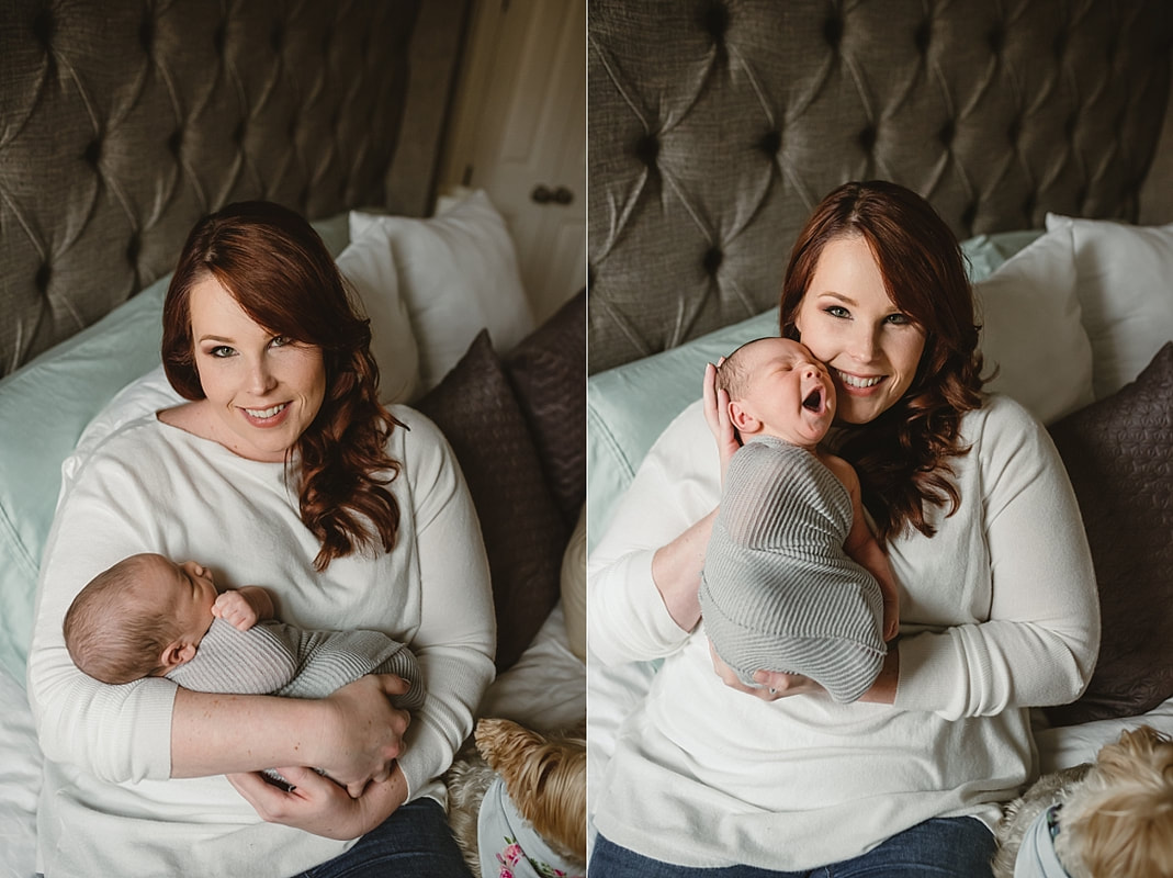 mother holding newborn baby on bed for lifestyle newborn photos in memphis
