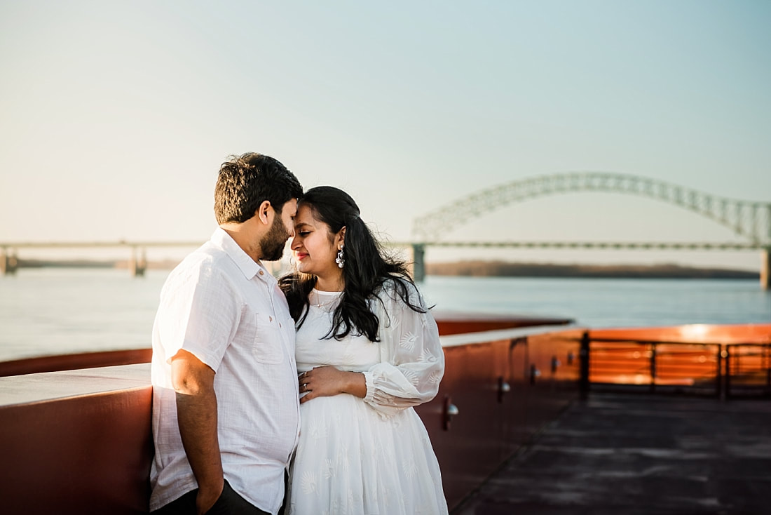 maternity session by the river with the m bridge downtown memphis