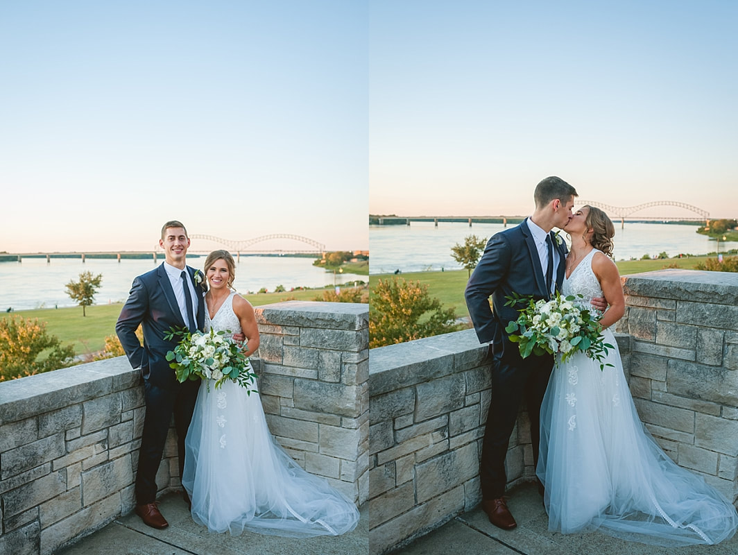 bride and groom in front of the m bridge over the mississippi river downtown memphis
