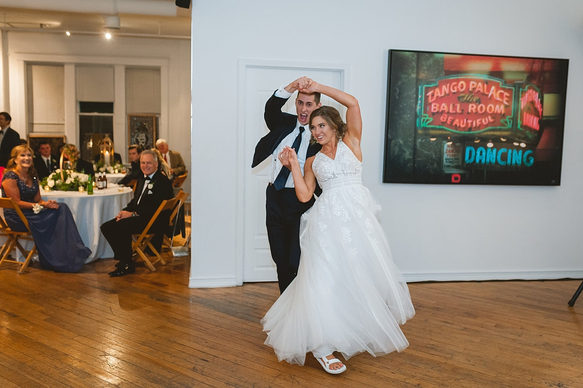 bride and groom's first dance at the robinson gallery downtown memphis