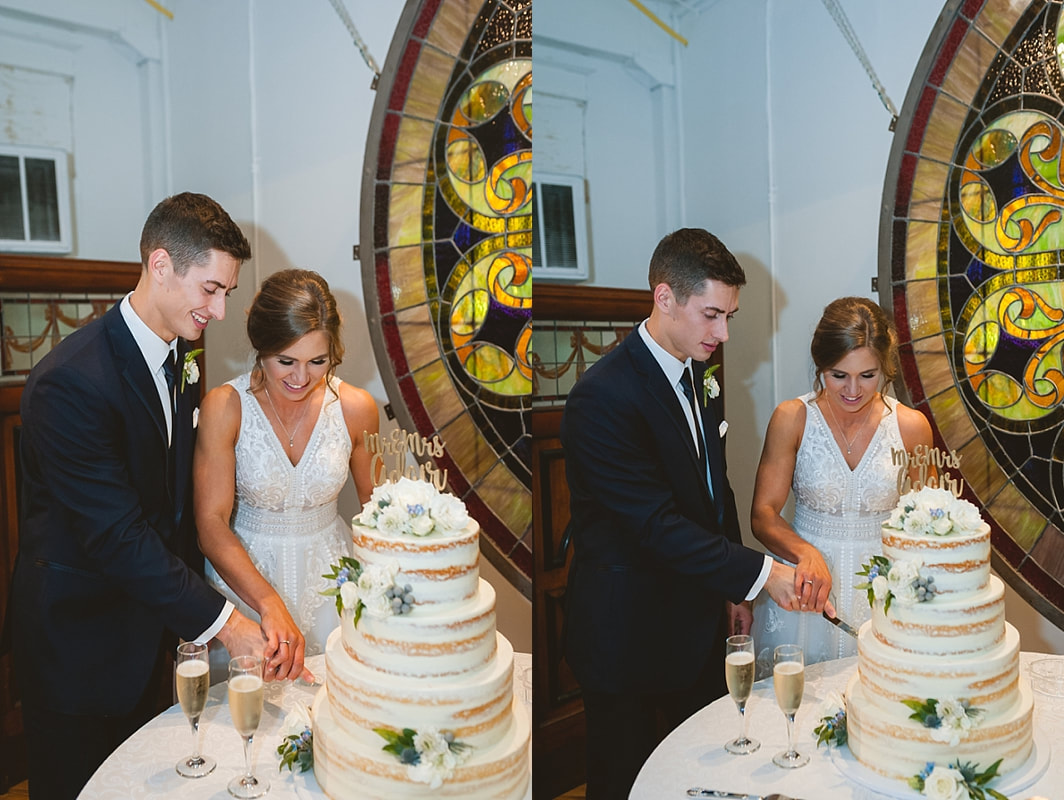 bride and groom cutting the cake at the robinson gallery downtown memphis