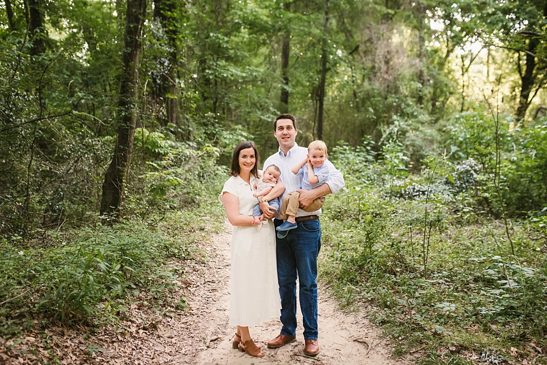 family portrait in the woods at Shelby Farms