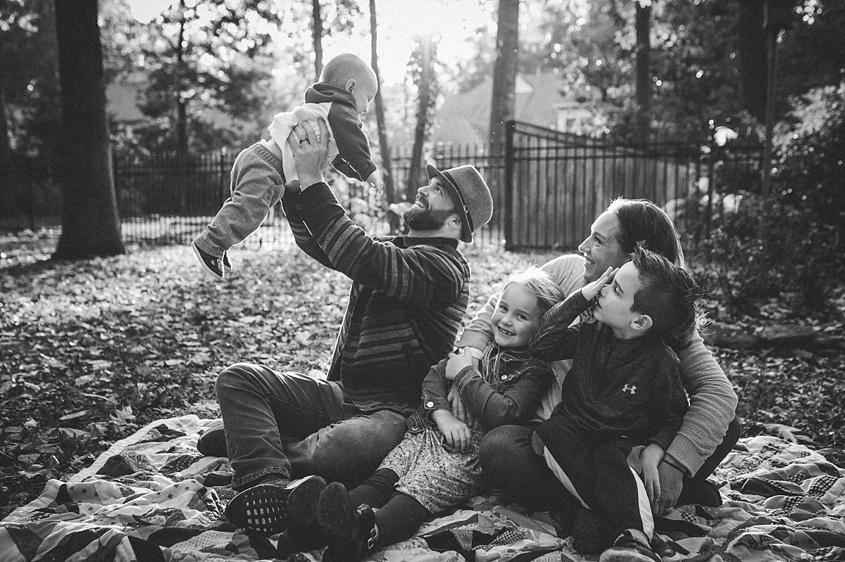 black and white family portrait during the fall in collierville, tn