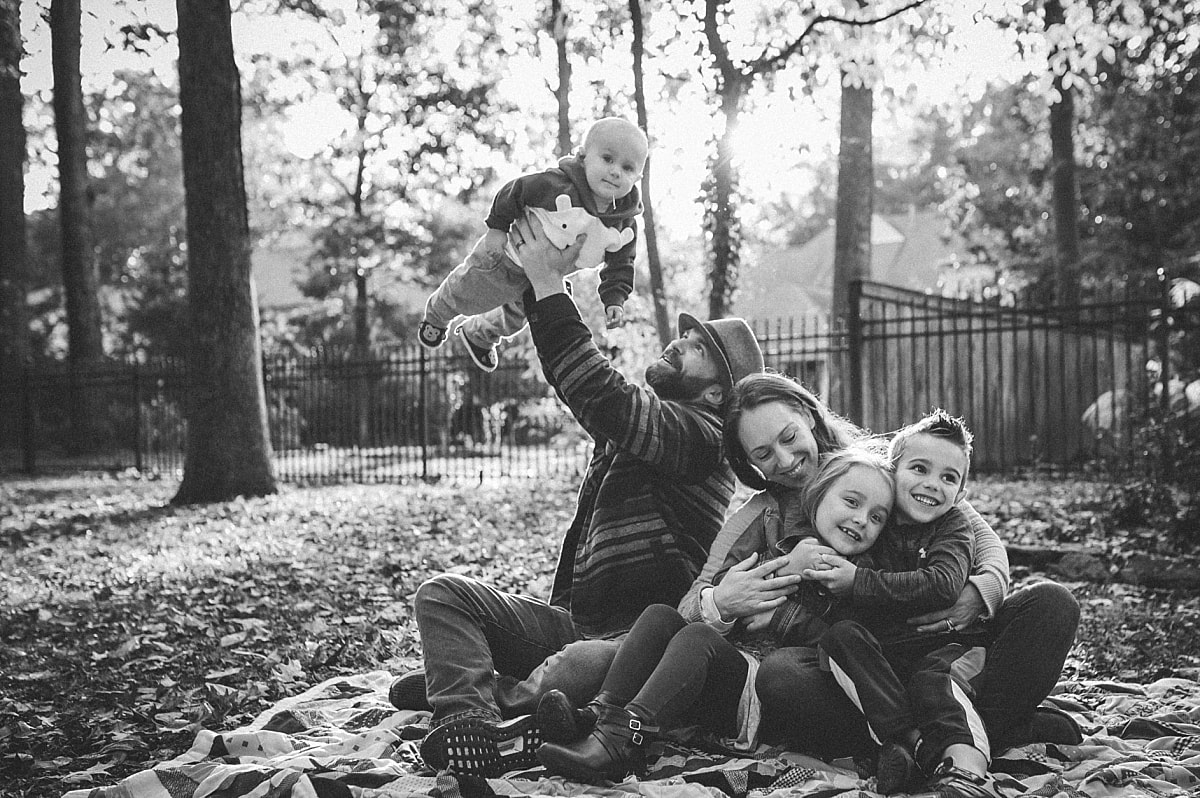 black and white family portrait during the fall in collierville, tn
