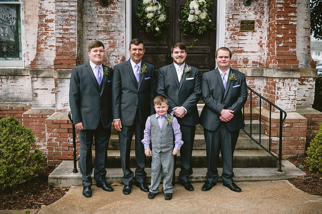 Groom with groomsmen portraits outside of Fillmore street Chapel, Corinth, MS