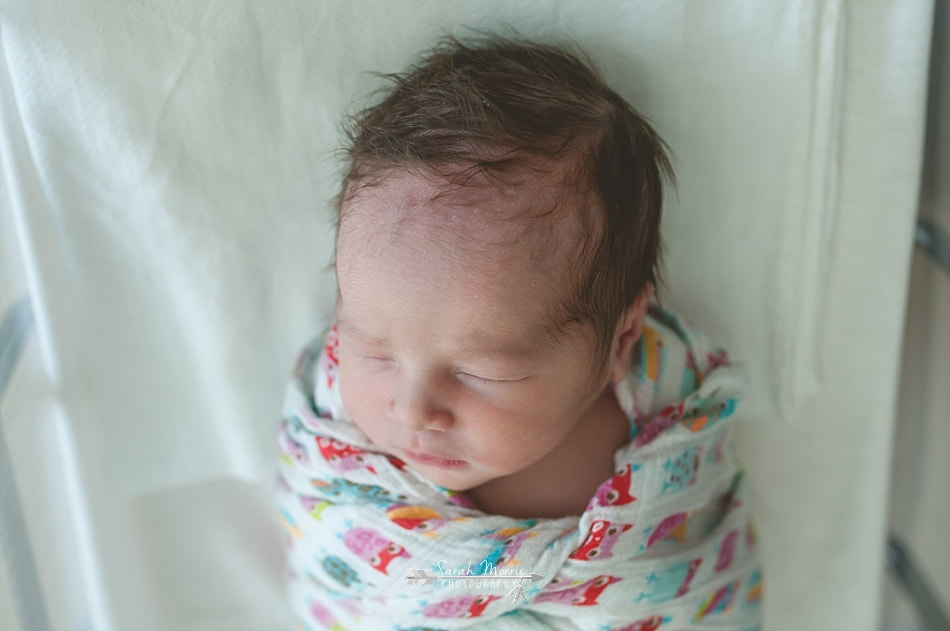 newborn baby girl swaddled in her bassinet at Methodist Le Bonheur Germantown Hospital