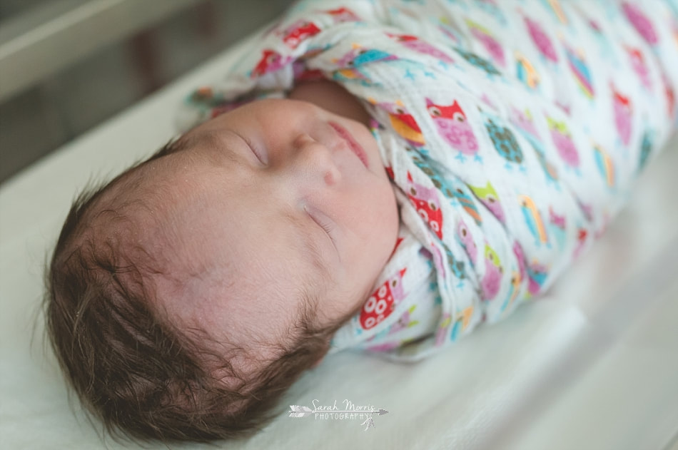 newborn baby girl swaddled in her bassinet at Methodist Le Bonheur Germantown Hospital