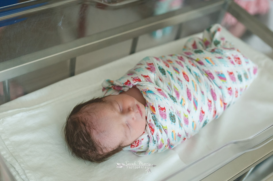 newborn baby girl swaddled in her bassinet at Methodist Le Bonheur Germantown Hospital