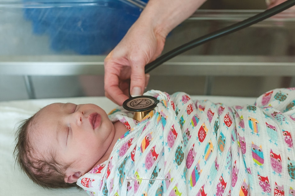 pediatric nurse checking newborn baby girl at Methodist Le Bonheur Germantown Hospital