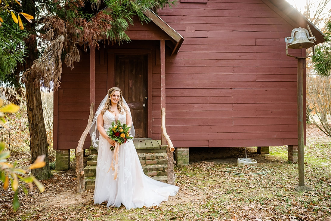 Bridal portrait in front of old school house at Green Frog Farm