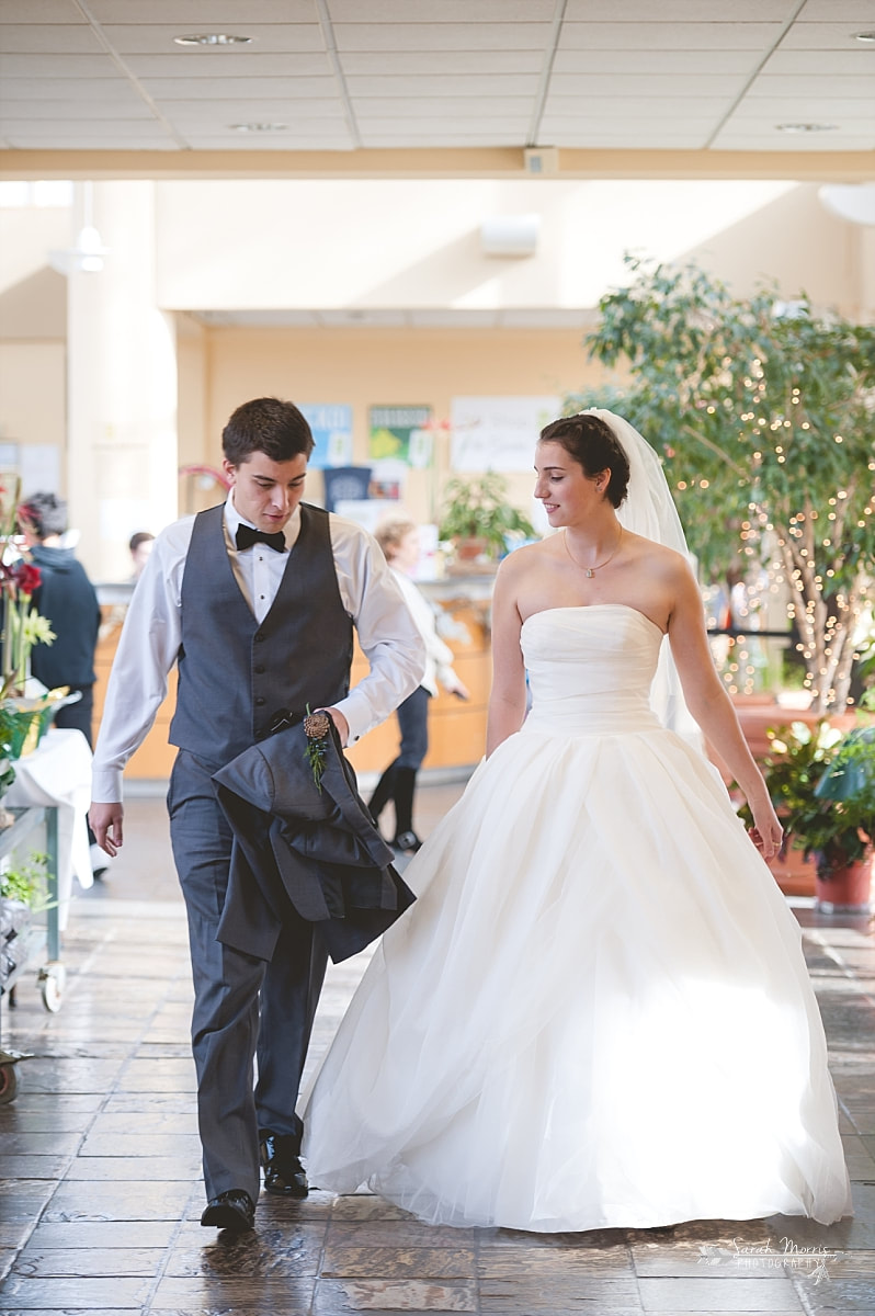 bride and groom entering their wedding reception at memphis botanic garden