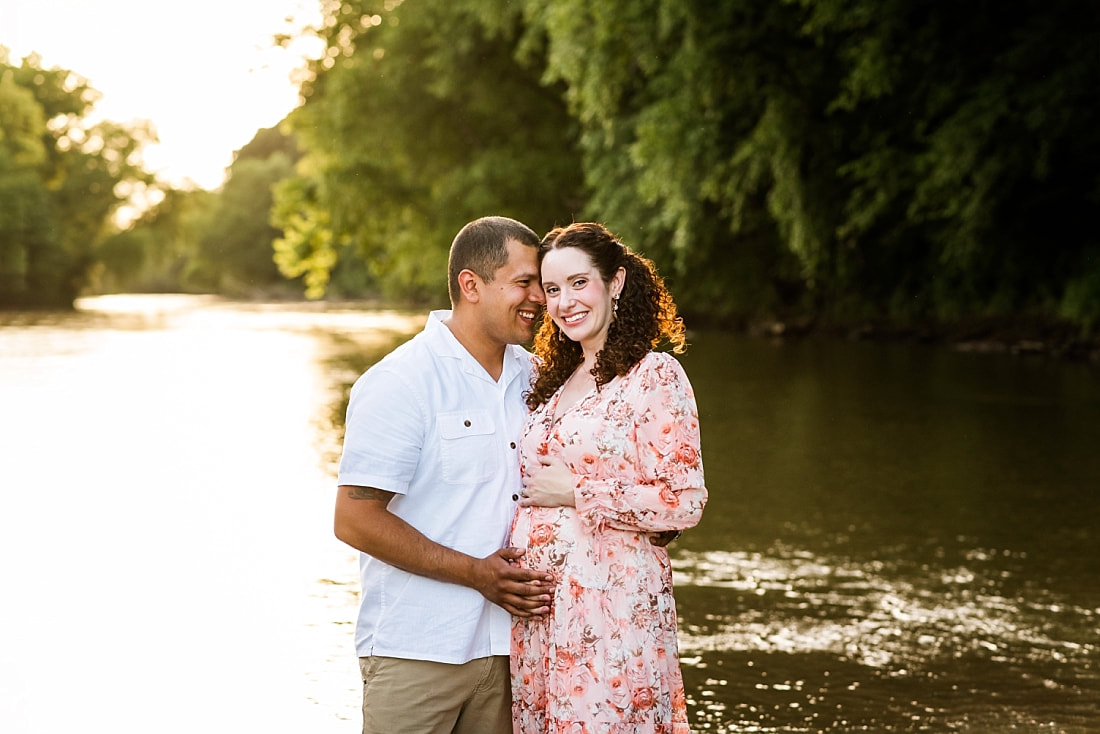 Portrait of pregnant mother and father at the creek in Memphis, TN