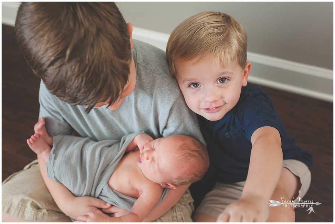 Newborn photos with older siblings