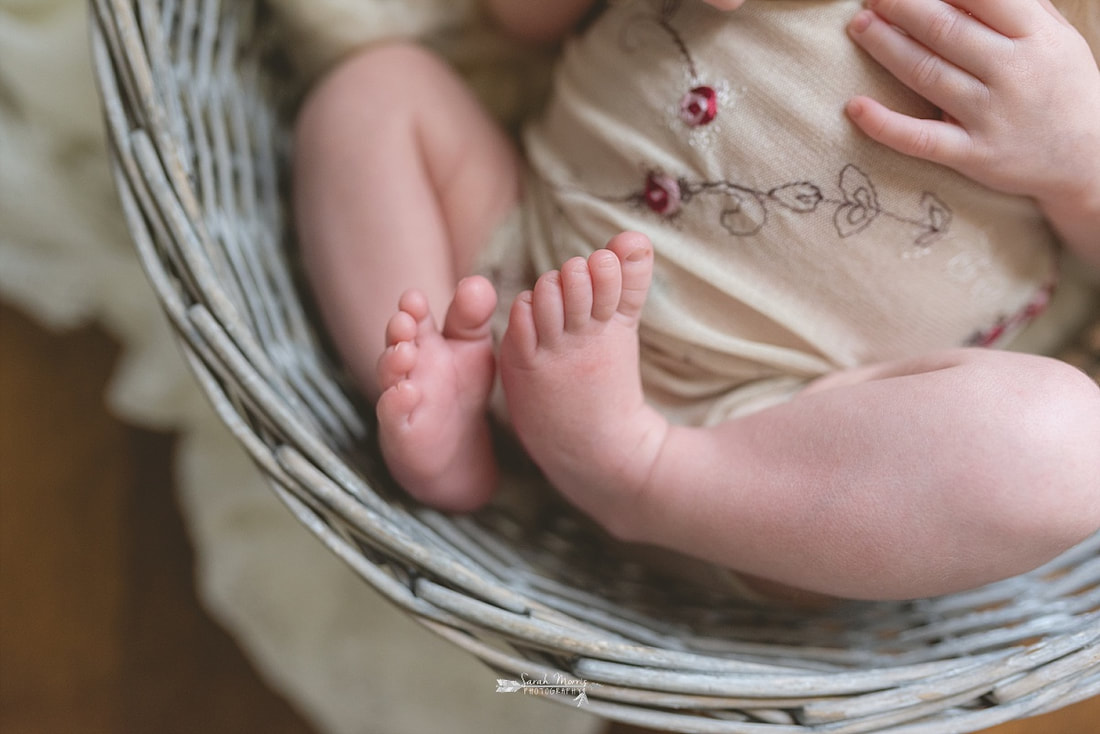 newborn baby girl's toes