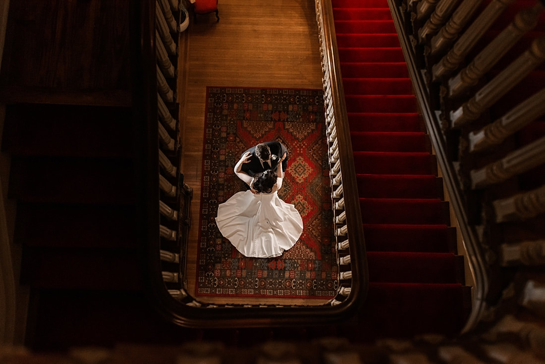 bride and groom + spiral staircase + Wedding at Woodruff-Fontaine in Memphis, TN
