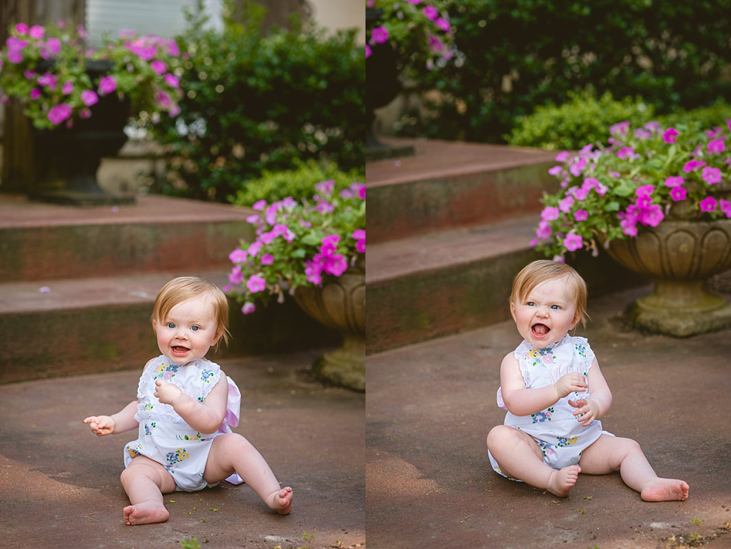baby girl's first birthday portrait in monogrammed bubble on the front porch during in home lifestyle family session in collierville, tn