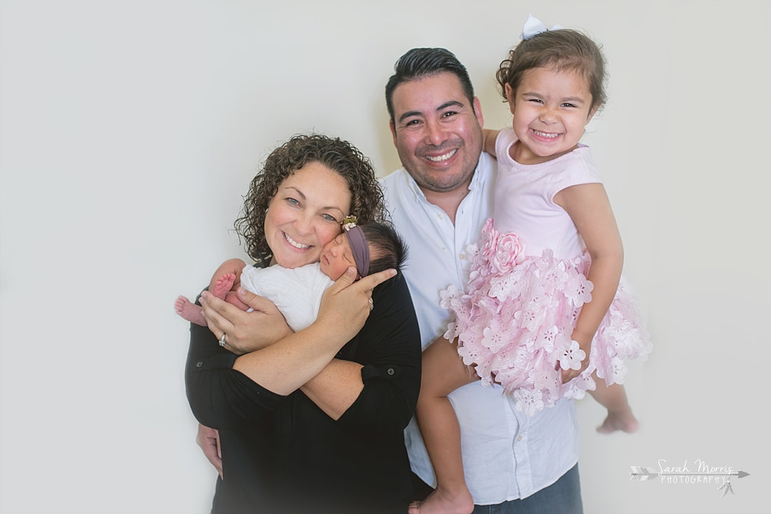 Family photo during the lifestyle portion of her newborn photo session