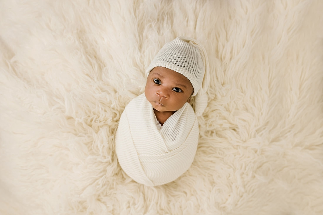 Baby Boy wrapped in cream blanket for newborn photos with Sarah Morris photography