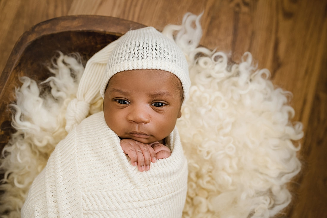 Newborn Baby boy wide awake for newborn portraits in Collierville, TN