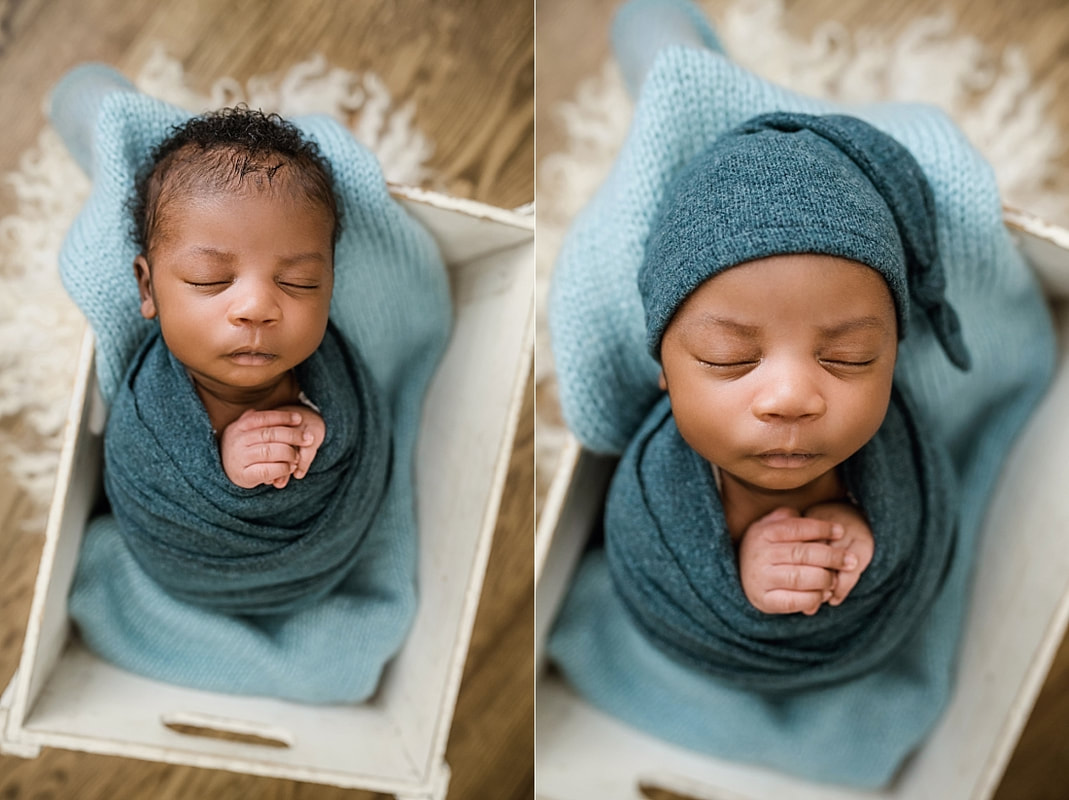 newborn baby wrapped in blue in wooden box for newborn session in Memphis, TN