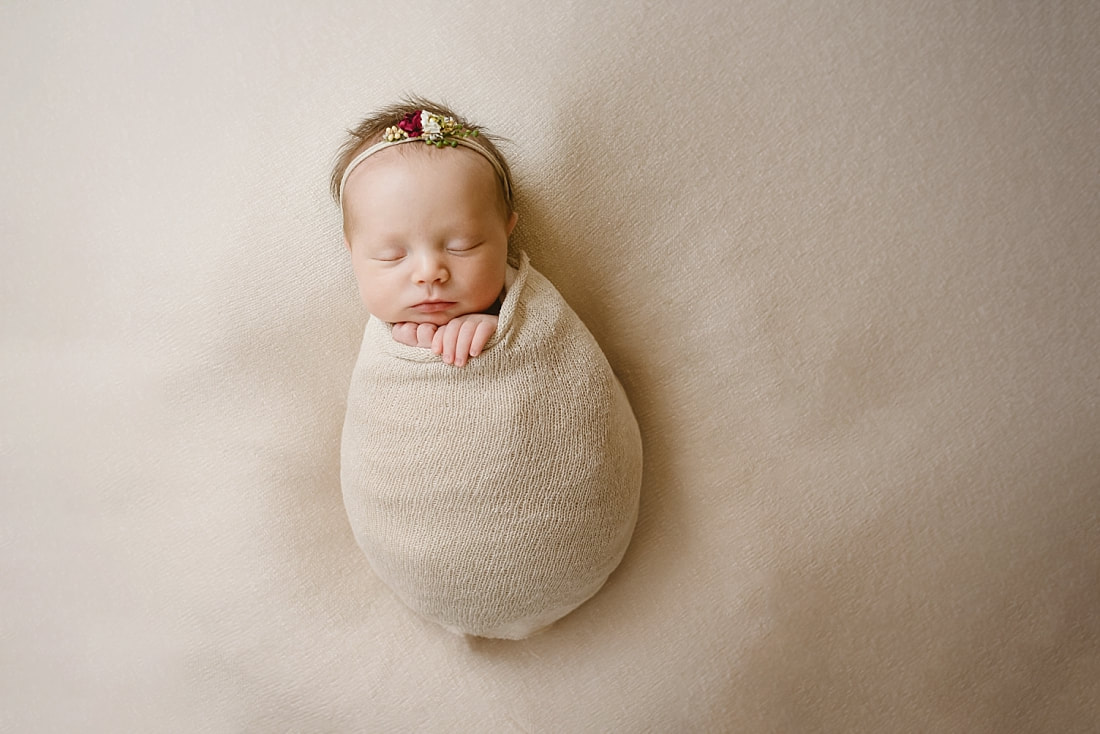 Baby Girl swaddled for newborn photoshoot in Memphis, TN