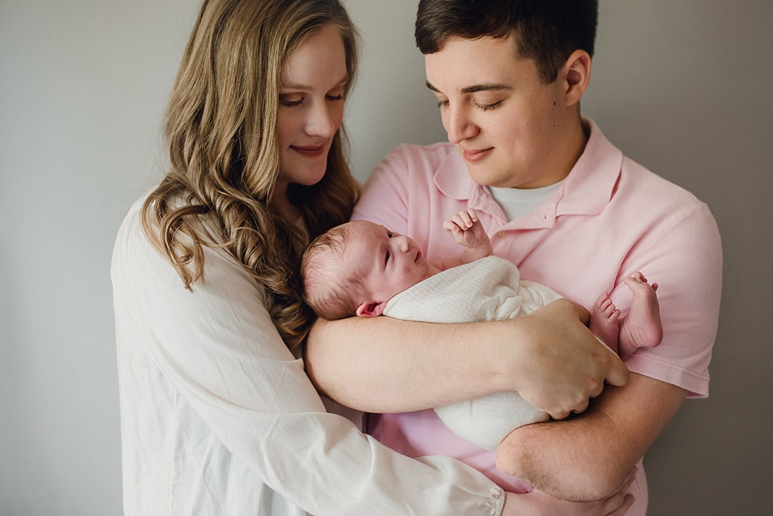 family of 3 during newborn photoshoot in Memphis