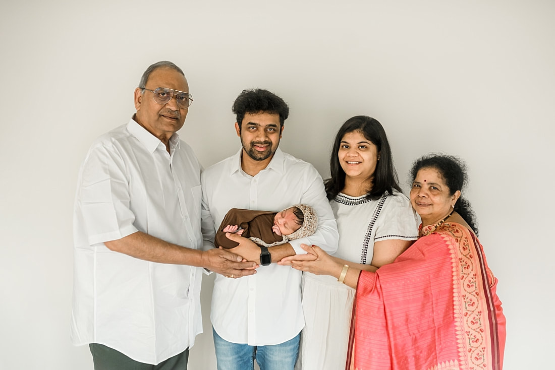 Indian family portrait with 3 generations