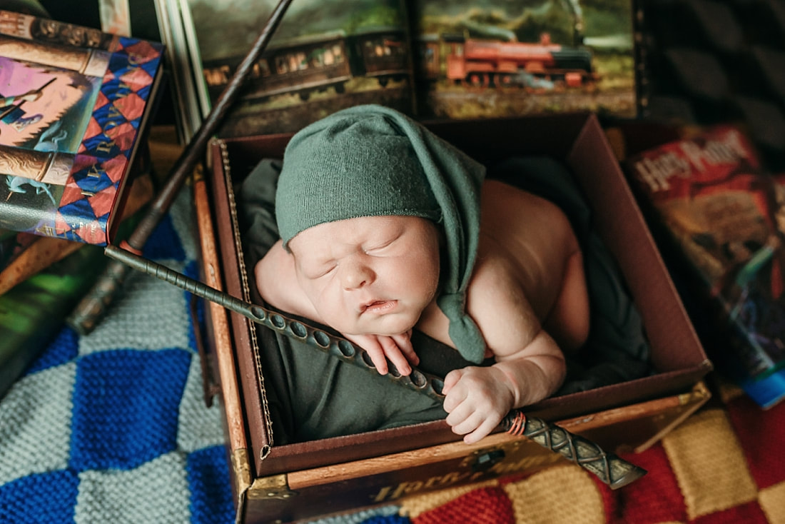 newborn baby boy posed in a Harry Potter scene in Memphis, TN