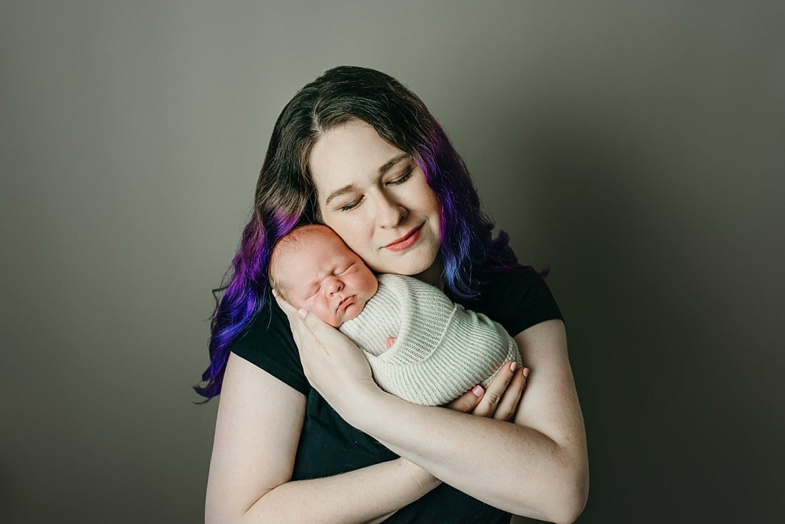 newborn baby with mom for newborn photos in Memphis, TN