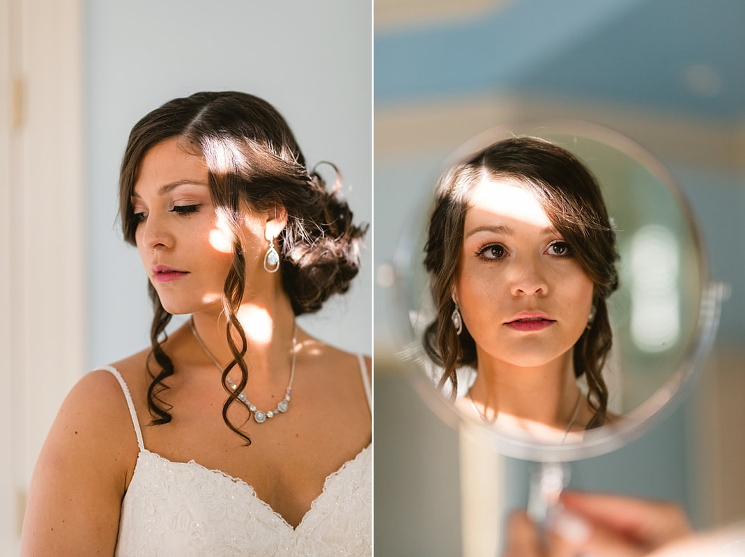 bride looking in the mirror at Orion Hill in Arlington, TN
