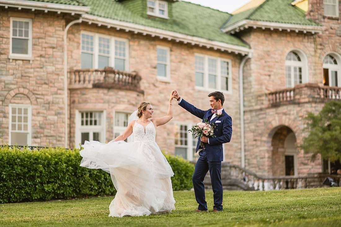 Bride and Groom twirling during Wedding Photos with Sarah Morris Photography + Pink Palace Wedding + Memphis, TN