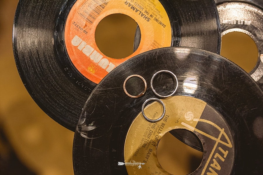Wedding rings laying on a pile of vinyl records at the Stax Museum