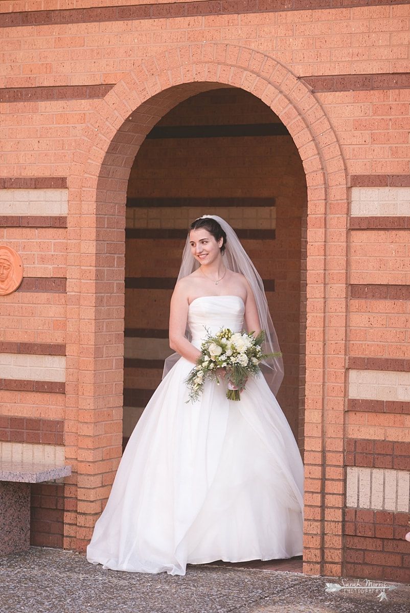 bridal portrait in the courtyard at St. Francis of Assisi Catholic Church