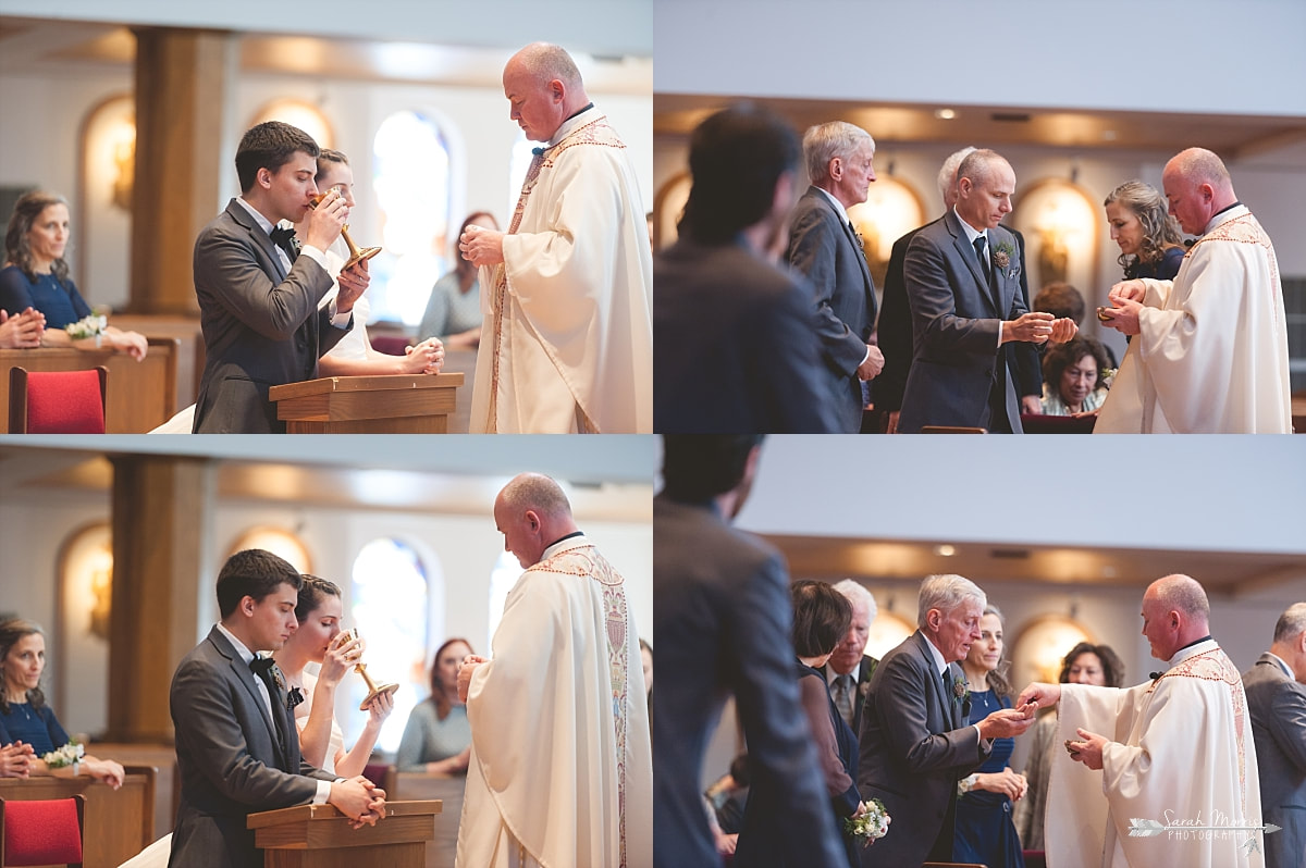 communion during wedding ceremony at St. Francis of Assisi Catholic Church