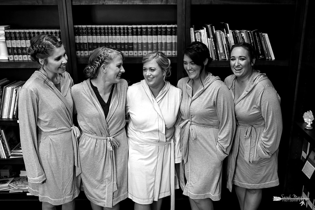 Bride and her bridesmaids in matching robes at Annunciation Greek Orthodox Church in Memphis, TN