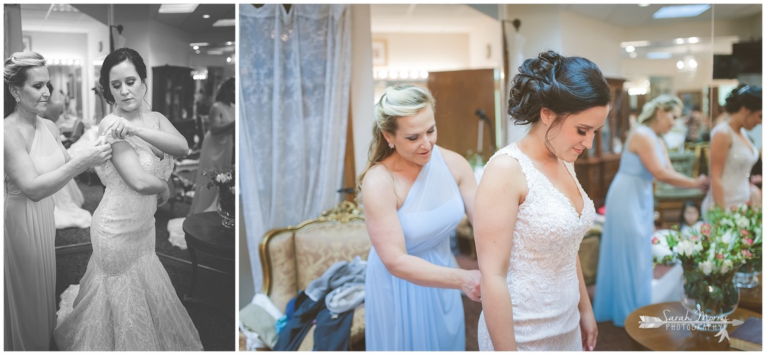 Mother of the bride buttoning bride's dress in the bride's room at Bellevue Baptist Church