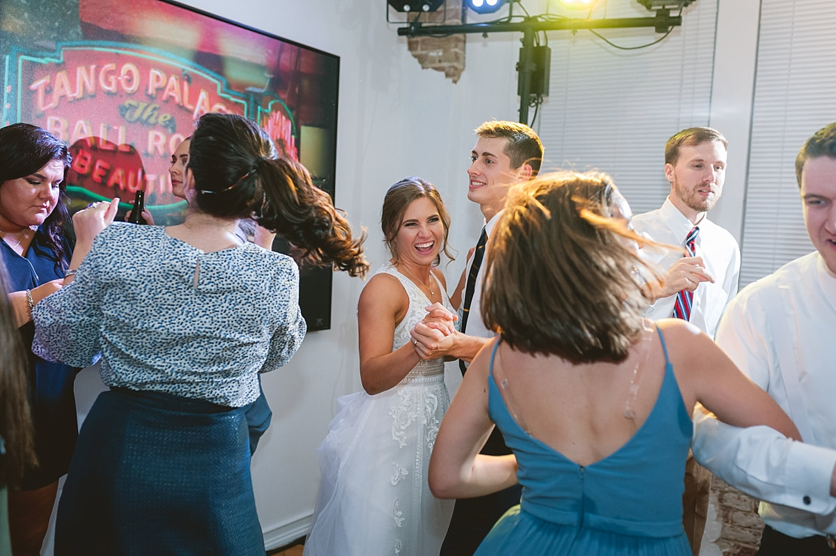 bride and groom dancing at the robinson gallery downtown memphis