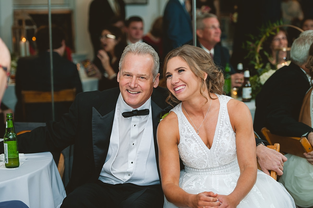 bride and father of the bride posing for a quick photo at at the robinson gallery downtown memphis