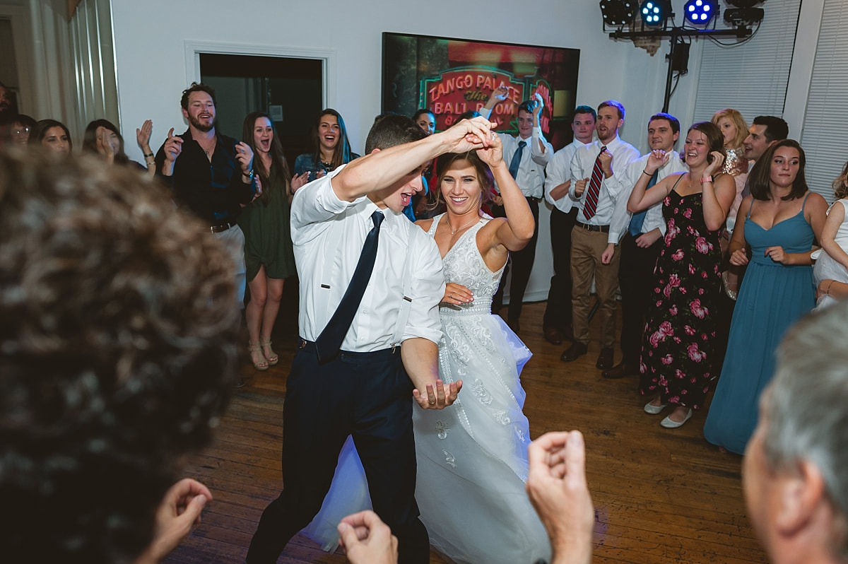 bride and groom dancing at the robinson gallery downtown memphis