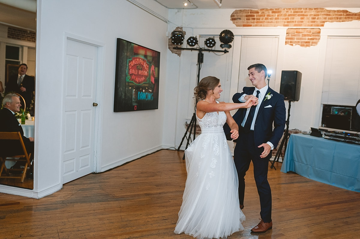 bride and groom's first dance at the robinson gallery downtown memphis