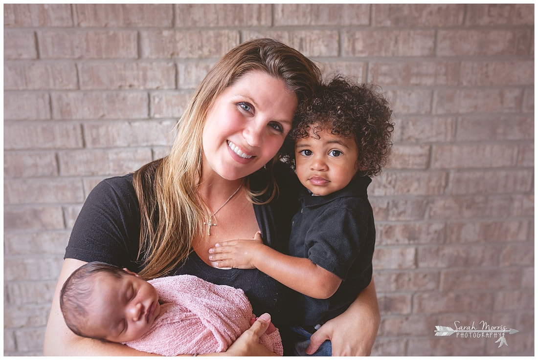 newborn photos of baby girl with mother and toddler sibling