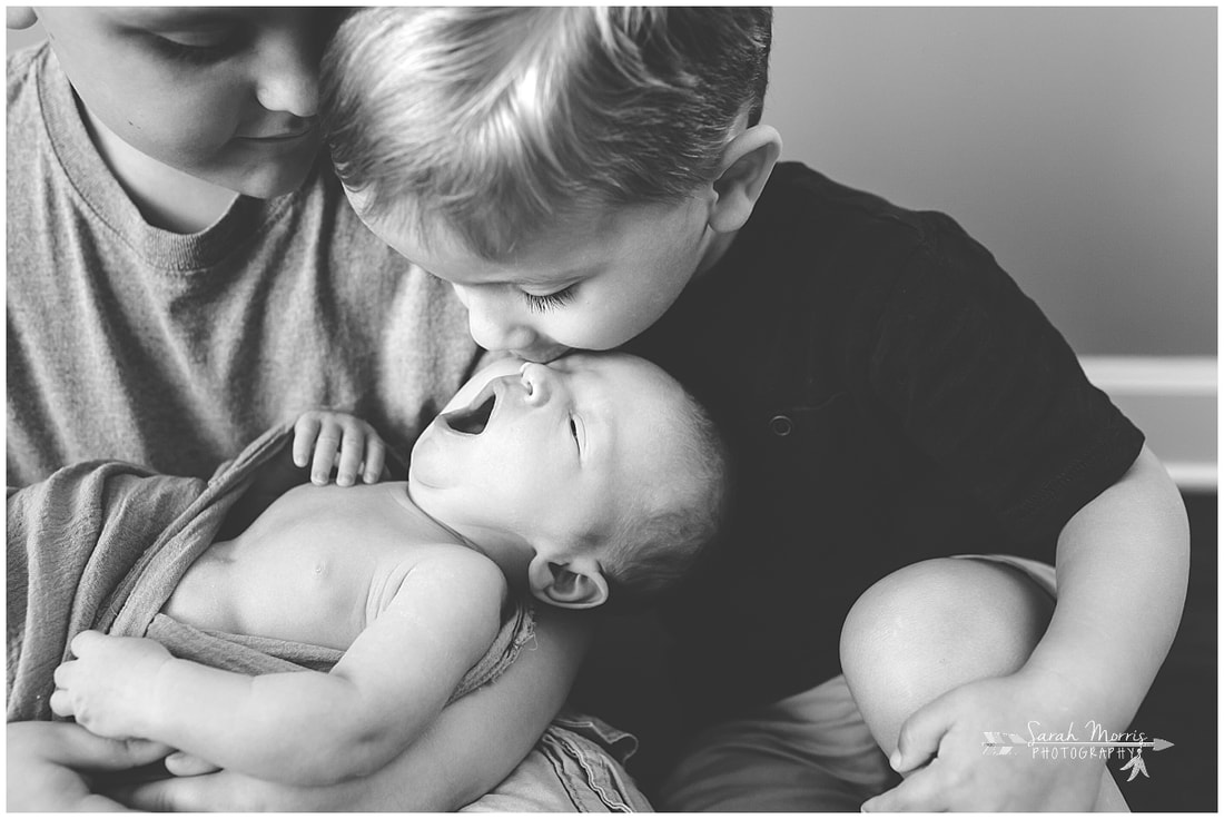 Newborn photos with older siblings