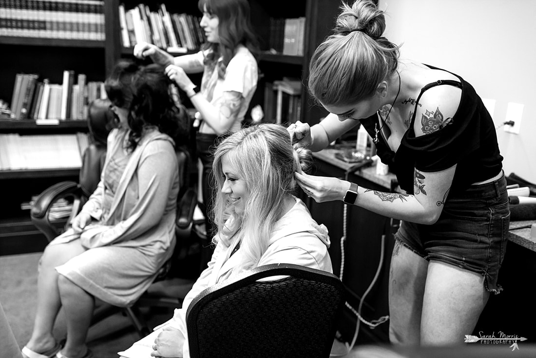 Bride getting her hair done at Annunciation Greek Orthodox Church in Memphis, TN